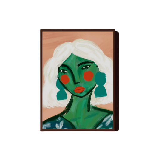 picture of lady with green skin, blue earrings, white hair and red lips