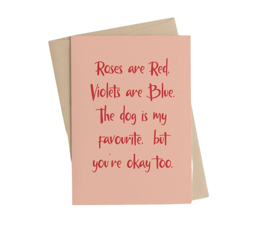 card with writing "roses are red, violets are blue, the dog is my favourite but you're okay too.