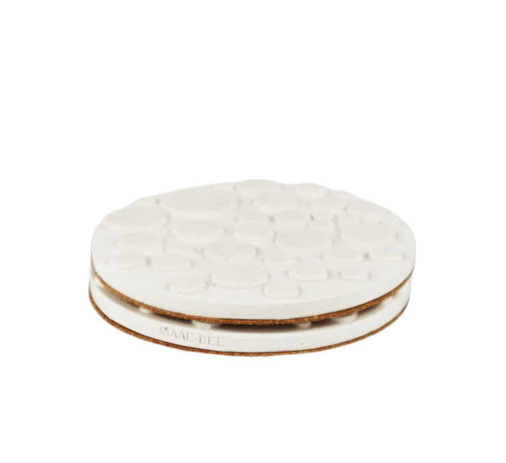 white bubble coaster with cork bottom